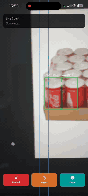 A screen recording of the iOS app: green boxes with confidence labels track Coke cans on a shelf as the phone pans across it, two blue vertical lines mark the counting band in the middle of the screen, and the live count rises from three to six